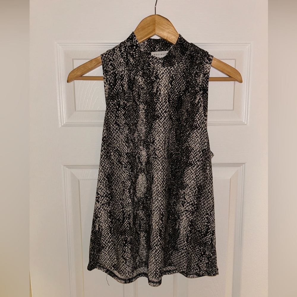 Flattering Socialite brand Top.